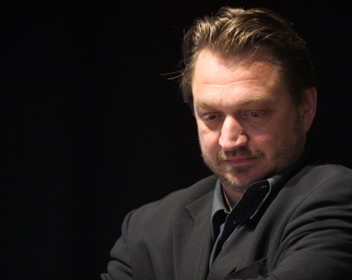 Tom Stromberg at Ttreffen2002Spiegelzelt_Good b Contemplative Tom Stromberg at the 2002 Theatertreffen. Photo: Daniel Mufson.